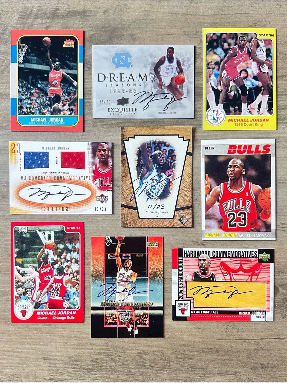 Michael Jordan Signed Rookie Lot of (9) Star Upper Deck Fleer Novelty Cards.